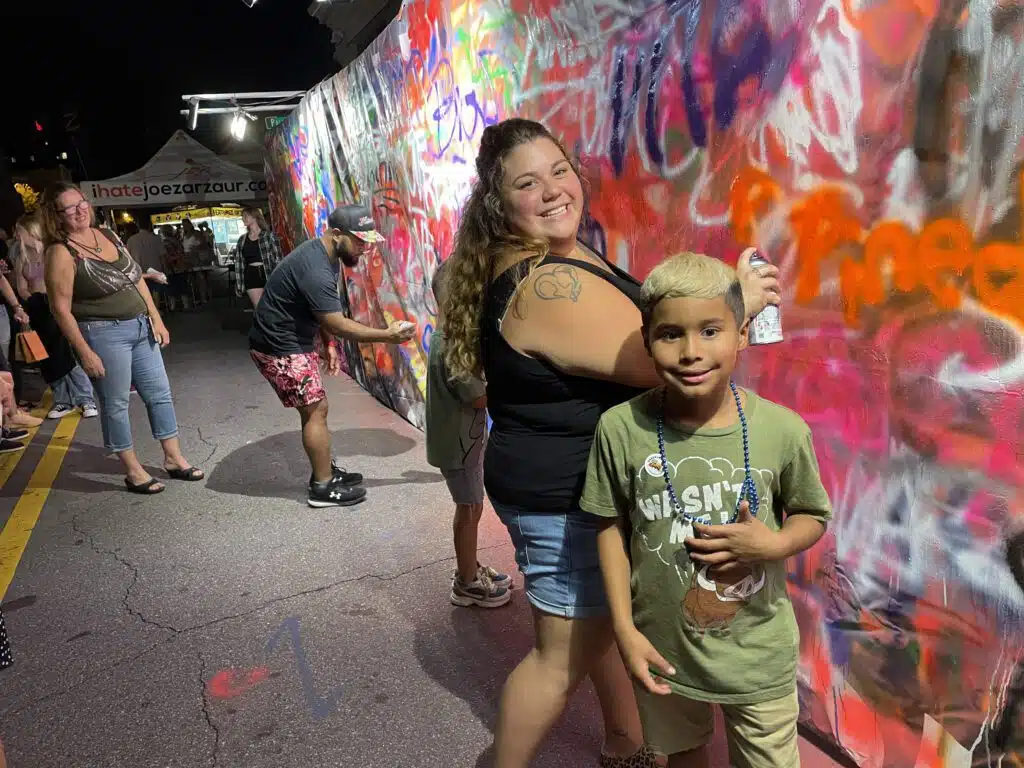 People enjoying Zarzaur's Legal Graffiti event in Pensacola