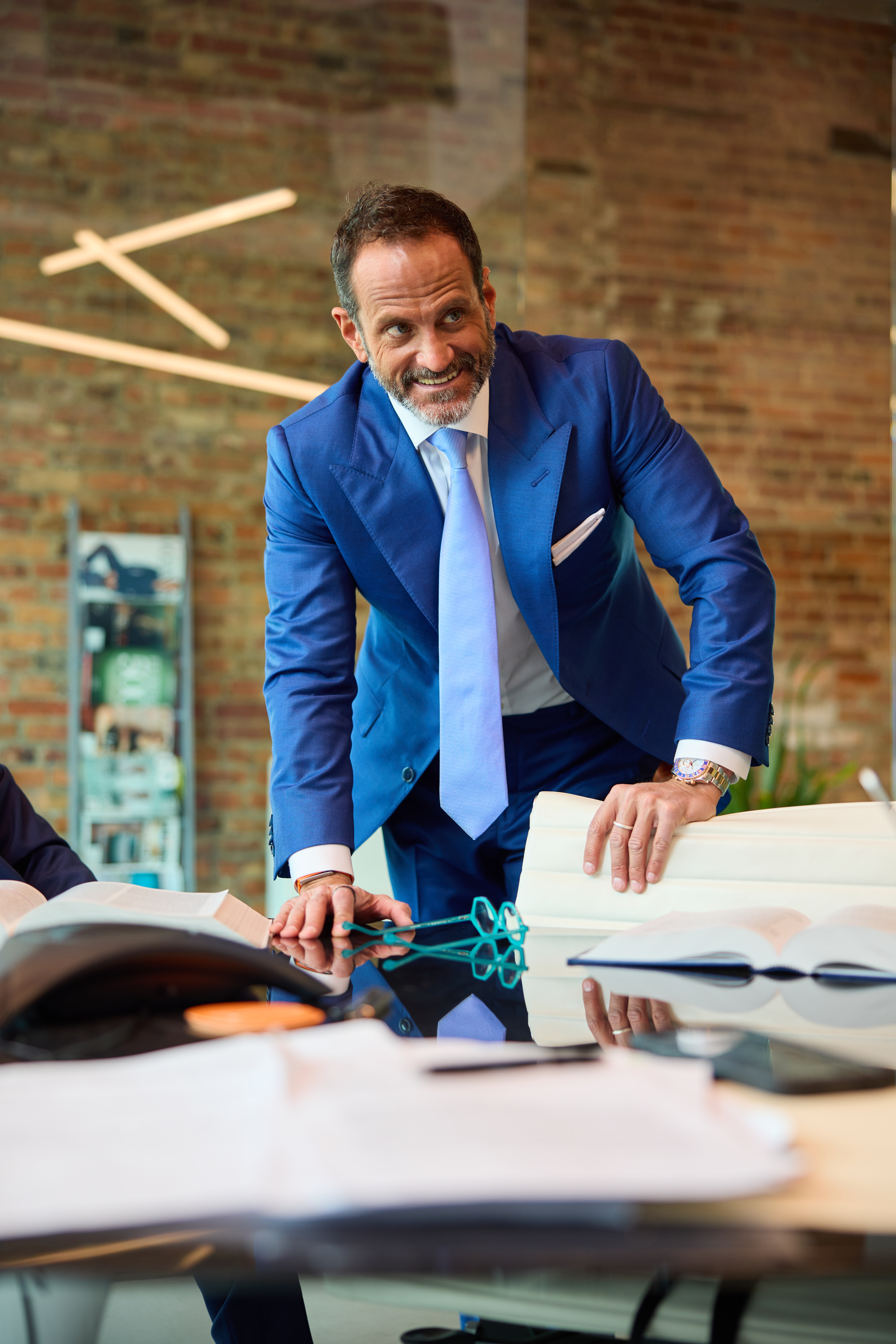 Pensacola personal injury lawyer Joe Zarzaur looking at case documents